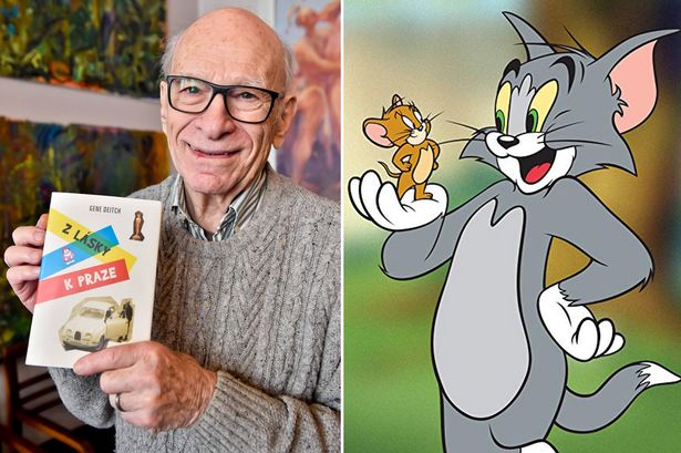Gene Deitch holding a copy of his book, besides which is a cover of Tom and Jerry. 
