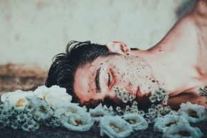 Gender Non-conforming - man in white flowers