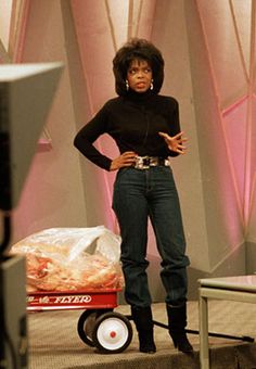 Best of Oprah Winfrey show: Oprah on weight loss with a radio flyer wagon filled with 67 pounds of animal fat.  Novemebr 1988
