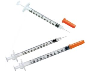 Syringes and needles image through which transfer of virus can happen. 
